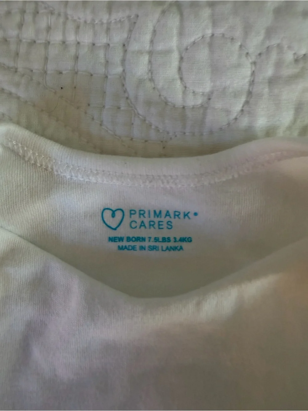 Carter’s & Primark assorted white short sleeved preemie onesies